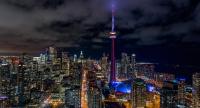 a view of the cn tower at night at Holiday Inn Toronto Downtown Centre by IHG in Toronto