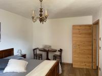 A bed or beds in a room at Casa Paolina - CIPAT 57814