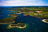 an aerial view of a group of islands in the water at Olivia Valkanela App 1 in Vrsar