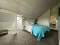 Ein Bett oder Betten in einem Zimmer der Unterkunft Auberge de Confignon