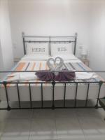 Posteľ alebo postele v izbe v ubytovaní City Apartment