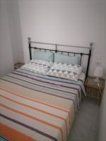 Posteľ alebo postele v izbe v ubytovaní City Apartment