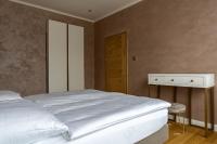 Posteľ alebo postele v izbe v ubytovaní Rosso Aparthotel