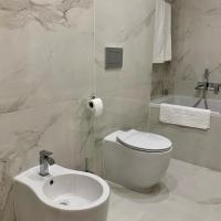 Kúpeľňa v ubytovaní Rosso Aparthotel