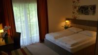 Łóżko lub łóżka w pokoju w obiekcie Hotel Alta Vista