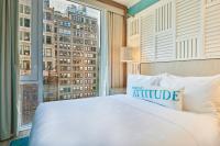 Ein Bett oder Betten in einem Zimmer der Unterkunft Margaritaville Resort Times Square