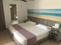 Posteľ alebo postele v izbe v ubytovaní Hotel Club S'Illot