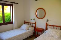 A bed or beds in a room at Villa Celia