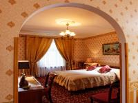 Łóżko lub łóżka w pokoju w obiekcie Hotel Europejski