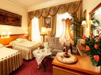 Łóżko lub łóżka w pokoju w obiekcie Hotel Europejski