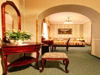 Łóżko lub łóżka w pokoju w obiekcie Hotel Europejski
