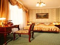 Łóżko lub łóżka w pokoju w obiekcie Hotel Europejski
