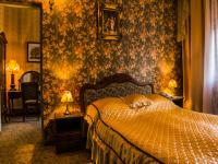 Łóżko lub łóżka w pokoju w obiekcie Hotel Europejski