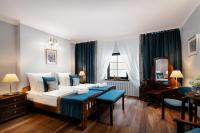 Łóżko lub łóżka w pokoju w obiekcie Baron Boutique Hotel