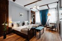 Łóżko lub łóżka w pokoju w obiekcie Baron Boutique Hotel