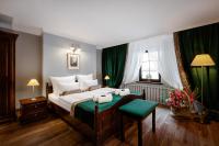 Łóżko lub łóżka w pokoju w obiekcie Baron Boutique Hotel