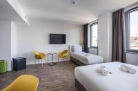 B&B Hotel Budapest Cityにあるベッド