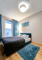 Posteľ alebo postele v izbe v ubytovaní LAGUNA Apartament Polanica Residence 12