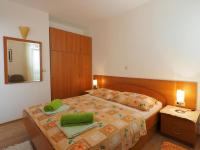 Posteľ alebo postele v izbe v ubytovaní Apartments & Room Eva Slano