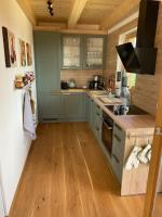 Plán poschodí v ubytovaní Chalet am Skigebiet mit Sauna, Bar, Billard, Carport und Kinderspielzimmer
