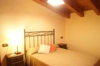 Postel nebo postele na pokoji v ubytování Casa Rural Ca Lazaro