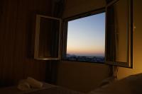 Posteľ alebo postele v izbe v ubytovaní Sunset Luxury Suite - Rooftop Apartment in the City Center