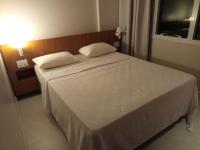 Apartamento no Salinas Exclusive Resortにあるベッド