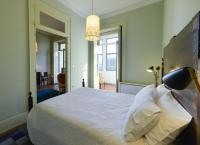 Postel nebo postele na pokoji v ubytování Maison des Amis Porto