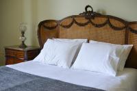 Postel nebo postele na pokoji v ubytování Maison des Amis Porto