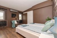 Posteľ alebo postele v izbe v ubytovaní Nightingale Luxury Apartment