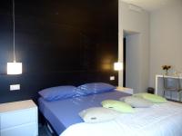 Posteľ alebo postele v izbe v ubytovaní Guest House Piazza Bologna