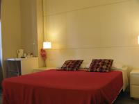 Posteľ alebo postele v izbe v ubytovaní Guest House Piazza Bologna