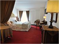 Łóżko lub łóżka w pokoju w obiekcie Hotel Villa Condulmer