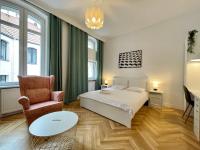 Łóżko lub łóżka w pokoju w obiekcie Chili Apartment