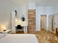 Łóżko lub łóżka w pokoju w obiekcie Chili Apartment