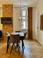 Telewizja i/lub zestaw kina domowego w obiekcie Chili Apartment