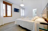 Postel nebo postele na pokoji v ubytování Tejón y Marín, nuevo apartamento en casco antigüo