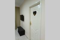TV a/nebo společenská místnost v ubytování sheraton blaza 101
