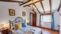 Posteľ alebo postele v izbe v ubytovaní Los Huertos Antequera - La Higuera by Ruralidays