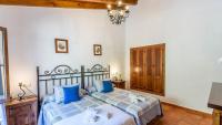 Posteľ alebo postele v izbe v ubytovaní Los Huertos Antequera - La Higuera by Ruralidays