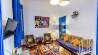 A television and/or entertainment centre at Villa El Patio Andaluz Velez-Malaga by Ruralidays