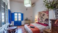 A bed or beds in a room at Villa El Patio Andaluz Velez-Malaga by Ruralidays