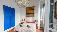 A bed or beds in a room at Villa El Patio Andaluz Velez-Malaga by Ruralidays