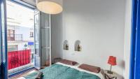 A bed or beds in a room at Villa El Patio Andaluz Velez-Malaga by Ruralidays