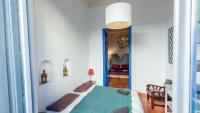 A bed or beds in a room at Villa El Patio Andaluz Velez-Malaga by Ruralidays