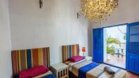 A bed or beds in a room at Villa El Patio Andaluz Velez-Malaga by Ruralidays