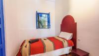 A bed or beds in a room at Villa El Patio Andaluz Velez-Malaga by Ruralidays