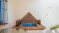 A seating area at Villa El Patio Andaluz Velez-Malaga by Ruralidays