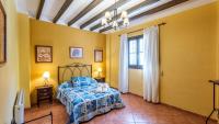 Postel nebo postele na pokoji v ubytování Villa Lagar Martinez Malaga by Ruralidays