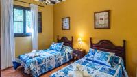 Postel nebo postele na pokoji v ubytování Villa Lagar Martinez Malaga by Ruralidays